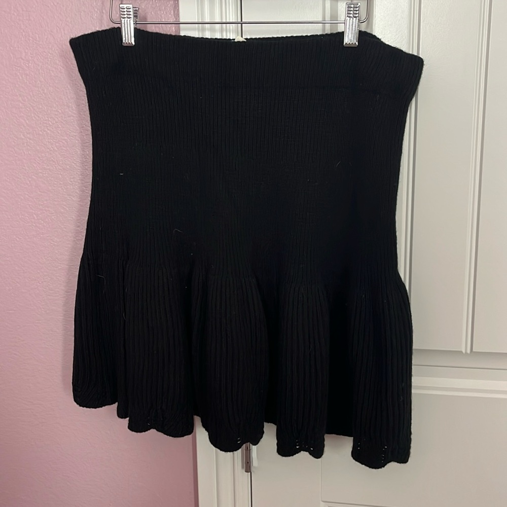 Anthropology black sweater skirt with tulip style detail.